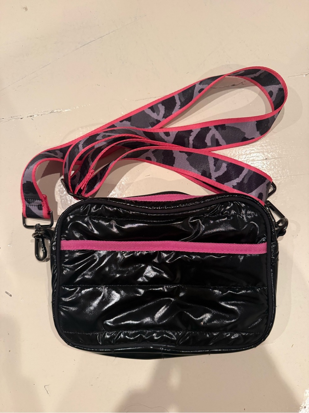 HAUTE SHORE Black Crossbody with Pink Trim and Camo Strap